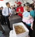 President Obama & Louis Bowles at box full of peanuts.